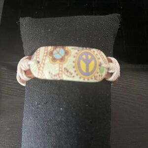 Leather bracelet.